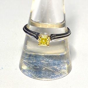 Platinum and square yellow diamond ring